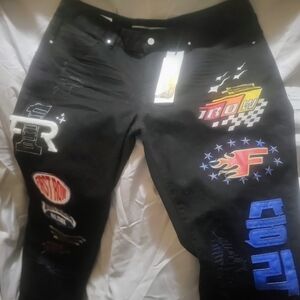 First Row Stretch JeaMen's Slim Fit Jeans with Graphic Patches.